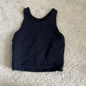 This is a Athleta tank top. Size kids 7 girls. Come in one color, black.